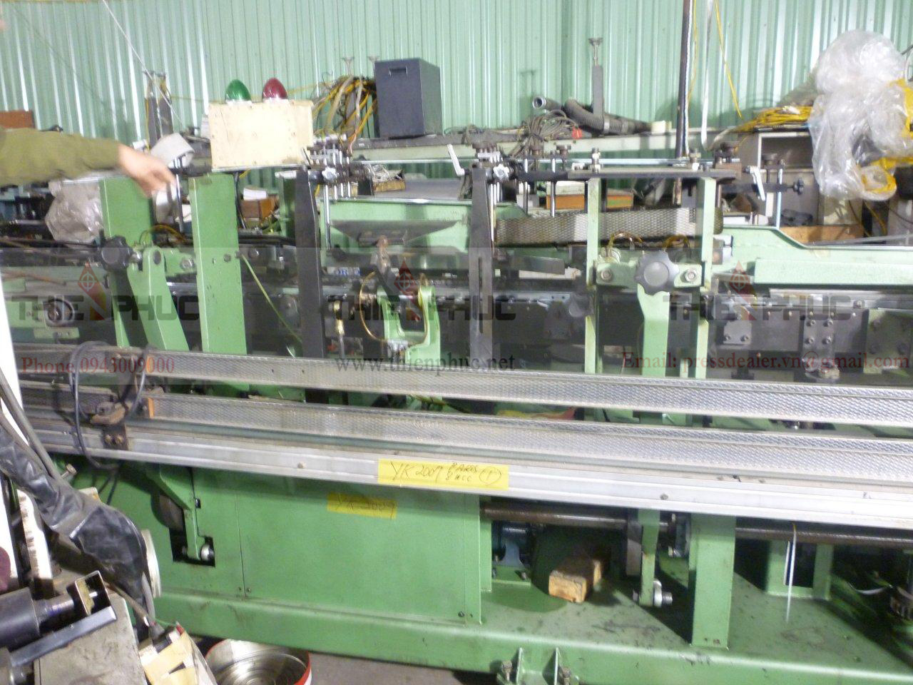 Máy cắt bụng gấp mép TP196