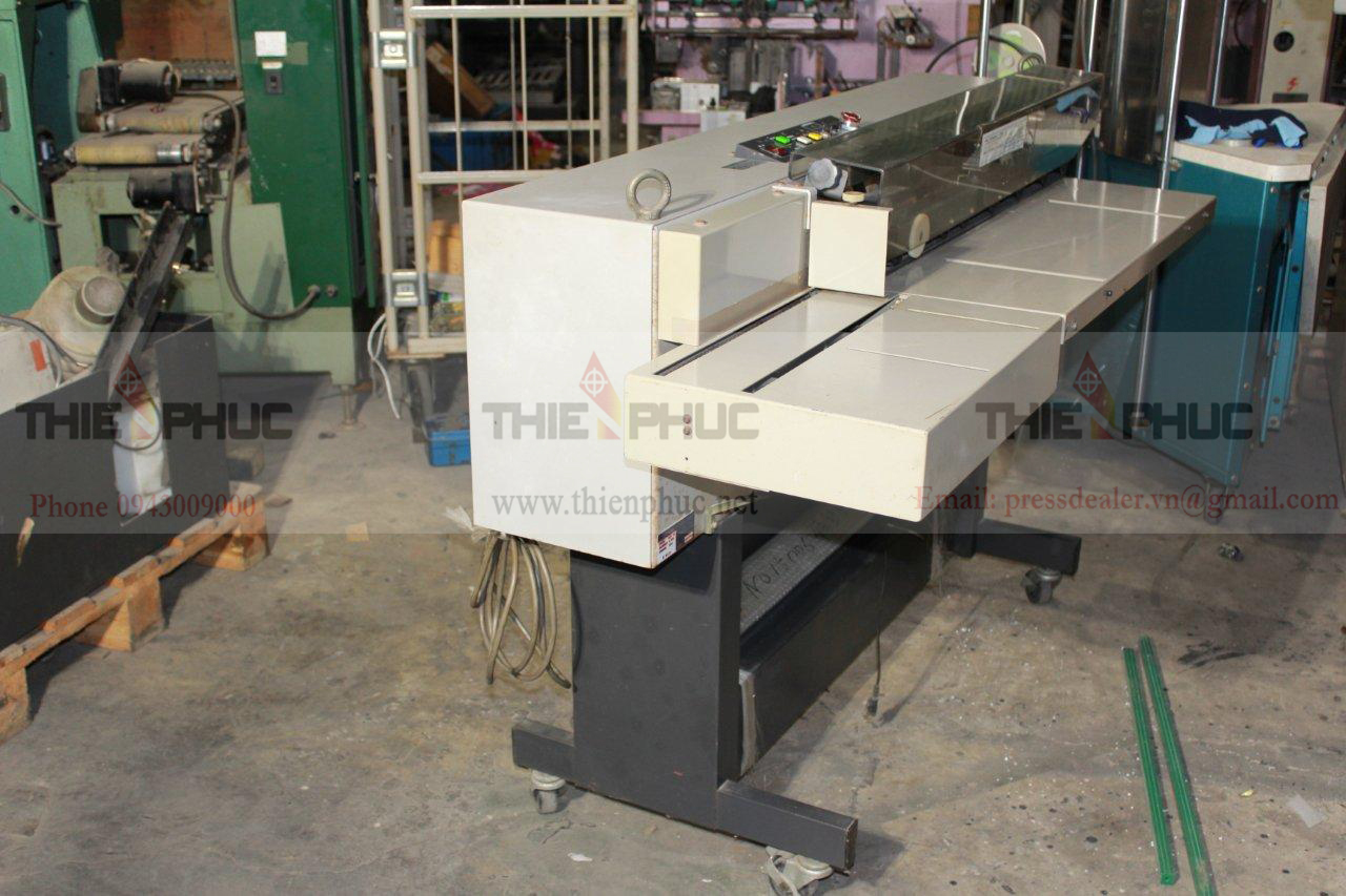 Máy dán băng gáy sách TP098