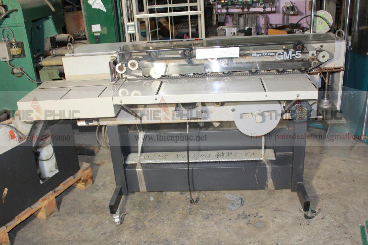 Máy dán băng gáy sách TP098