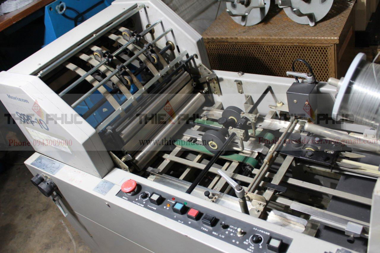 Máy đóng ghim sách 2 đầu TP210