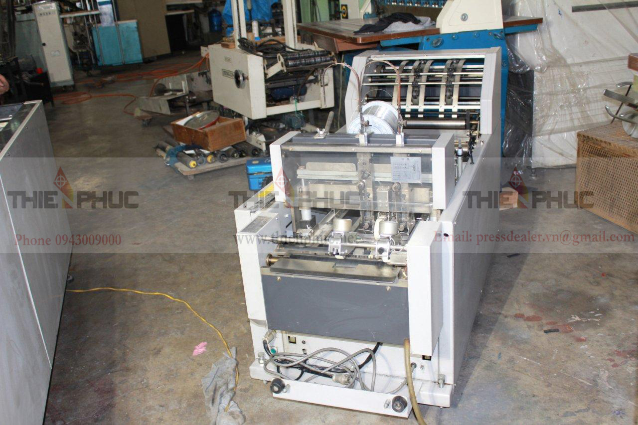 Máy đóng ghim sách 2 đầu TP210